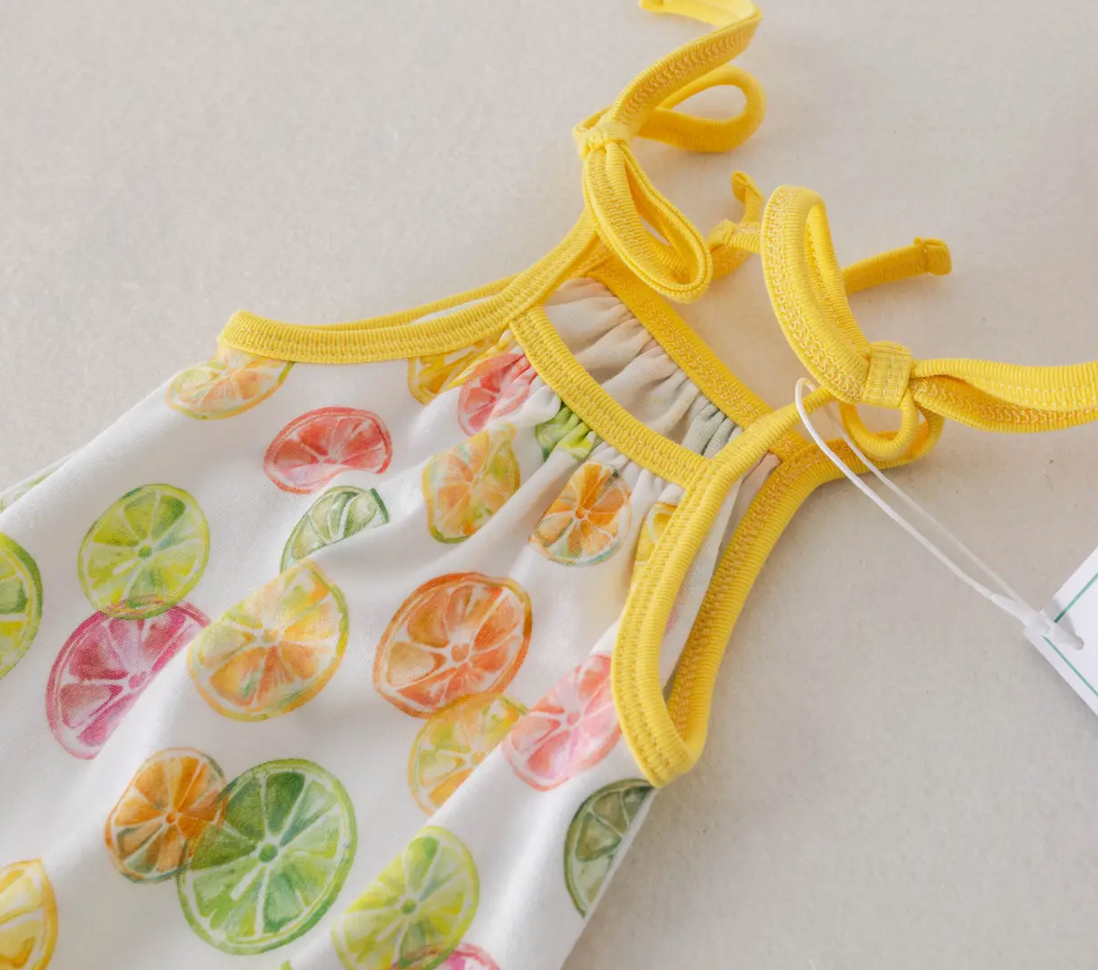 Squeeze the Day Shoulder-Tie Onesie