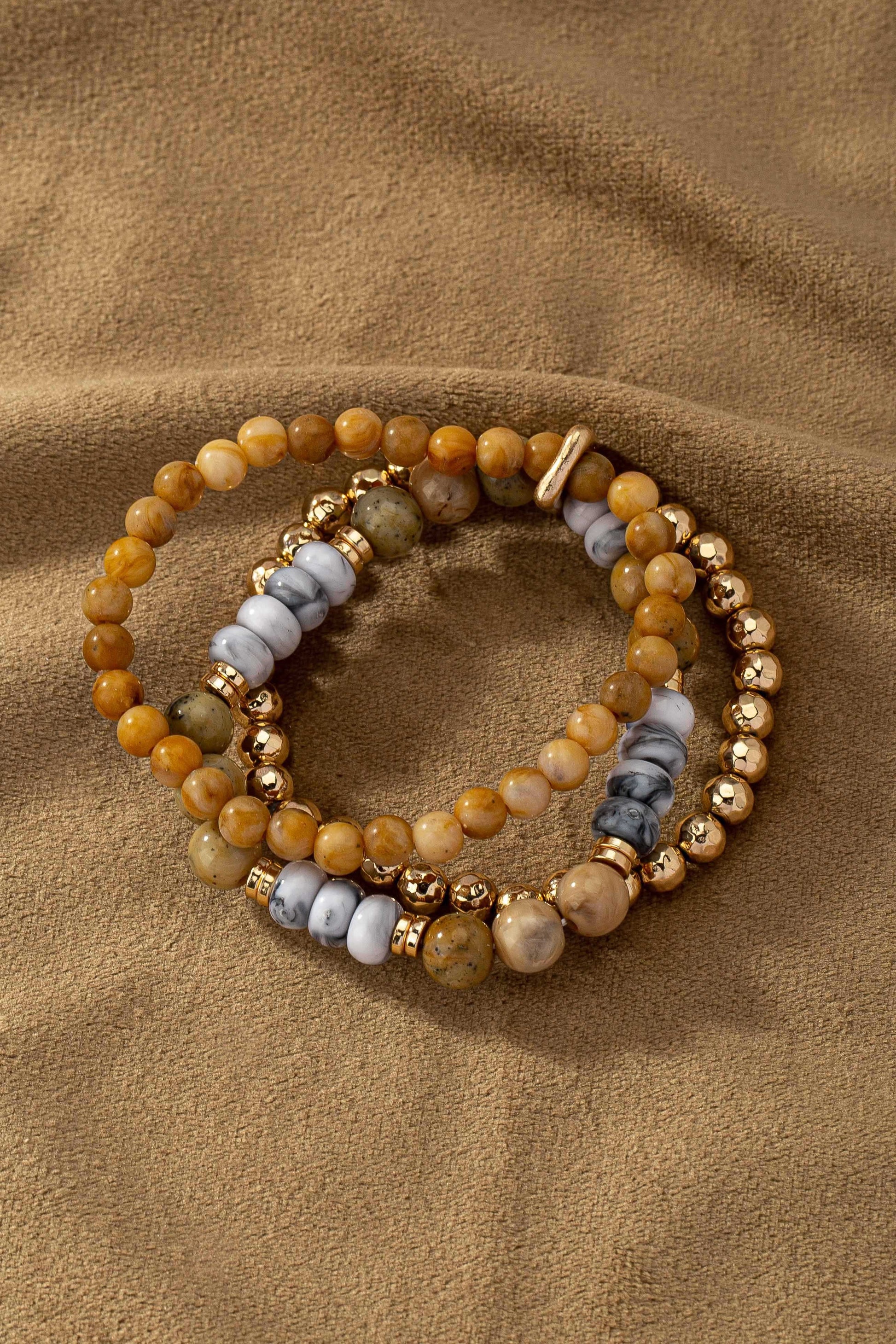 Brown 3 Row Bead Stretch Bracelet